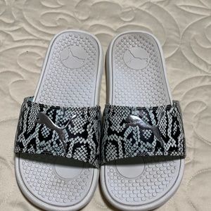 Puma slide on shoes in snakeskin print